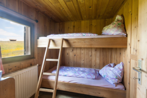 Schlafzimmer in unserer Almhütte auf der Seiser Alm